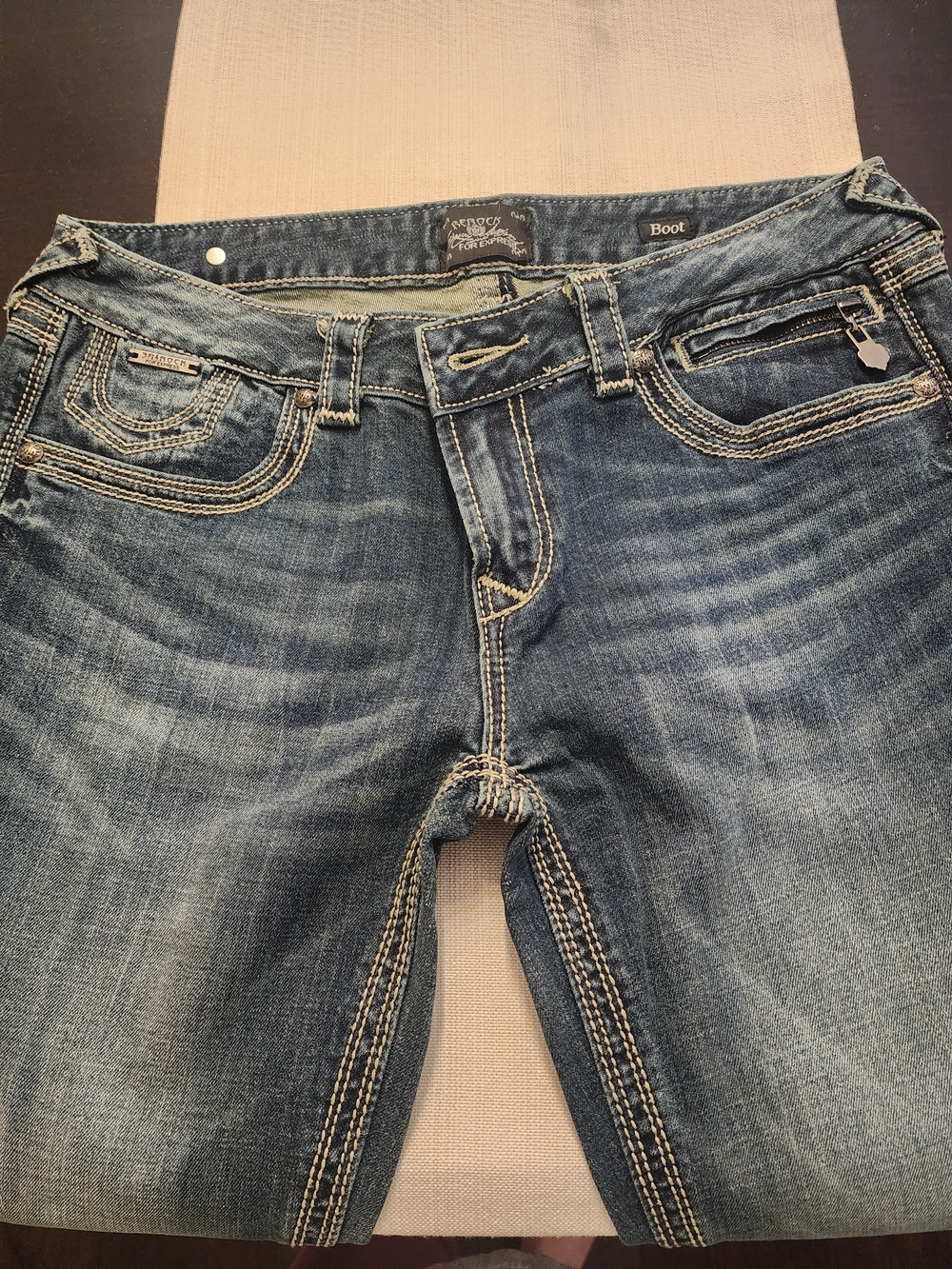 Express Women's Bootcut Jeans in Faded Blue with Contrast Stitching